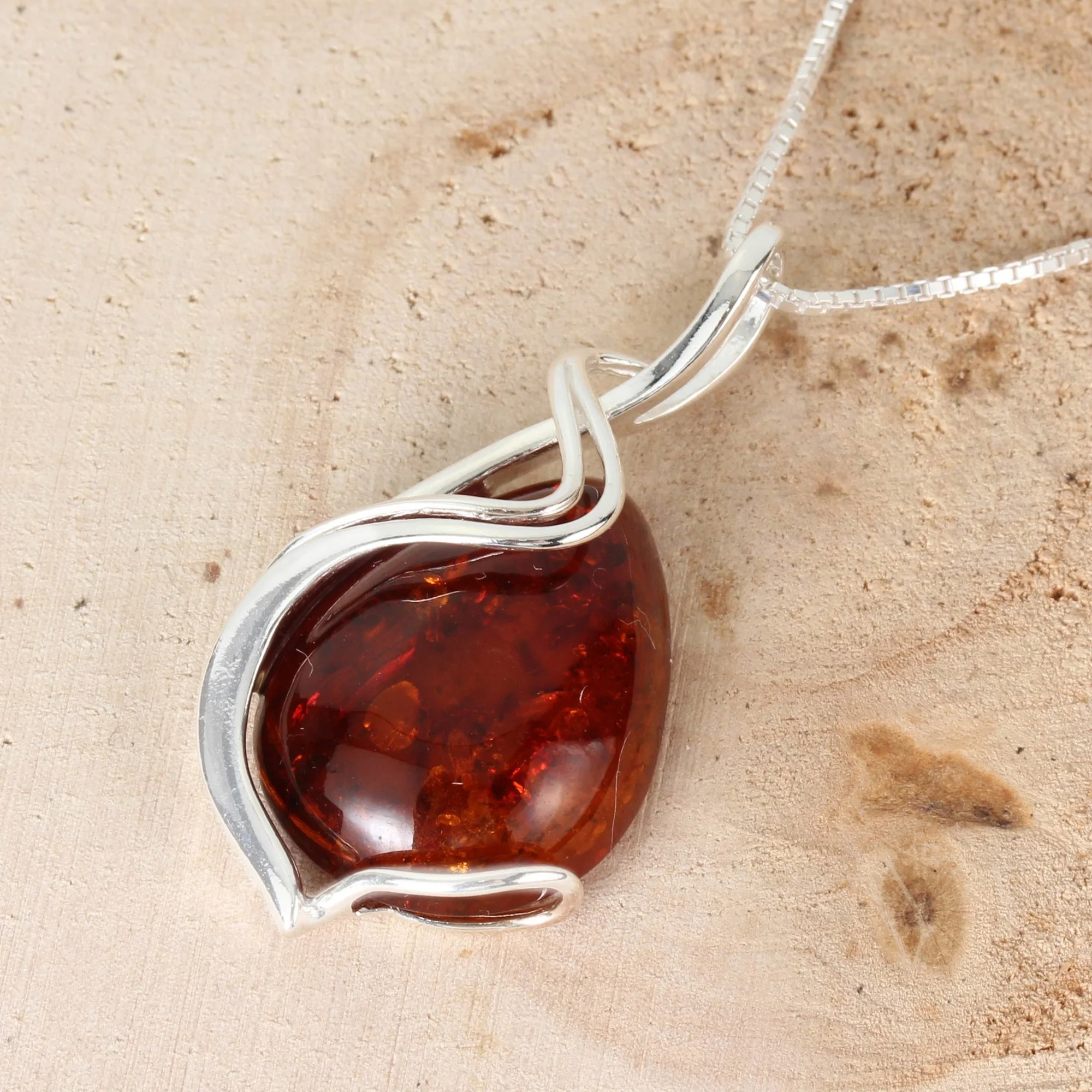 Baltic Amber Sterling Silver Pendant With Swirl Design Overlay