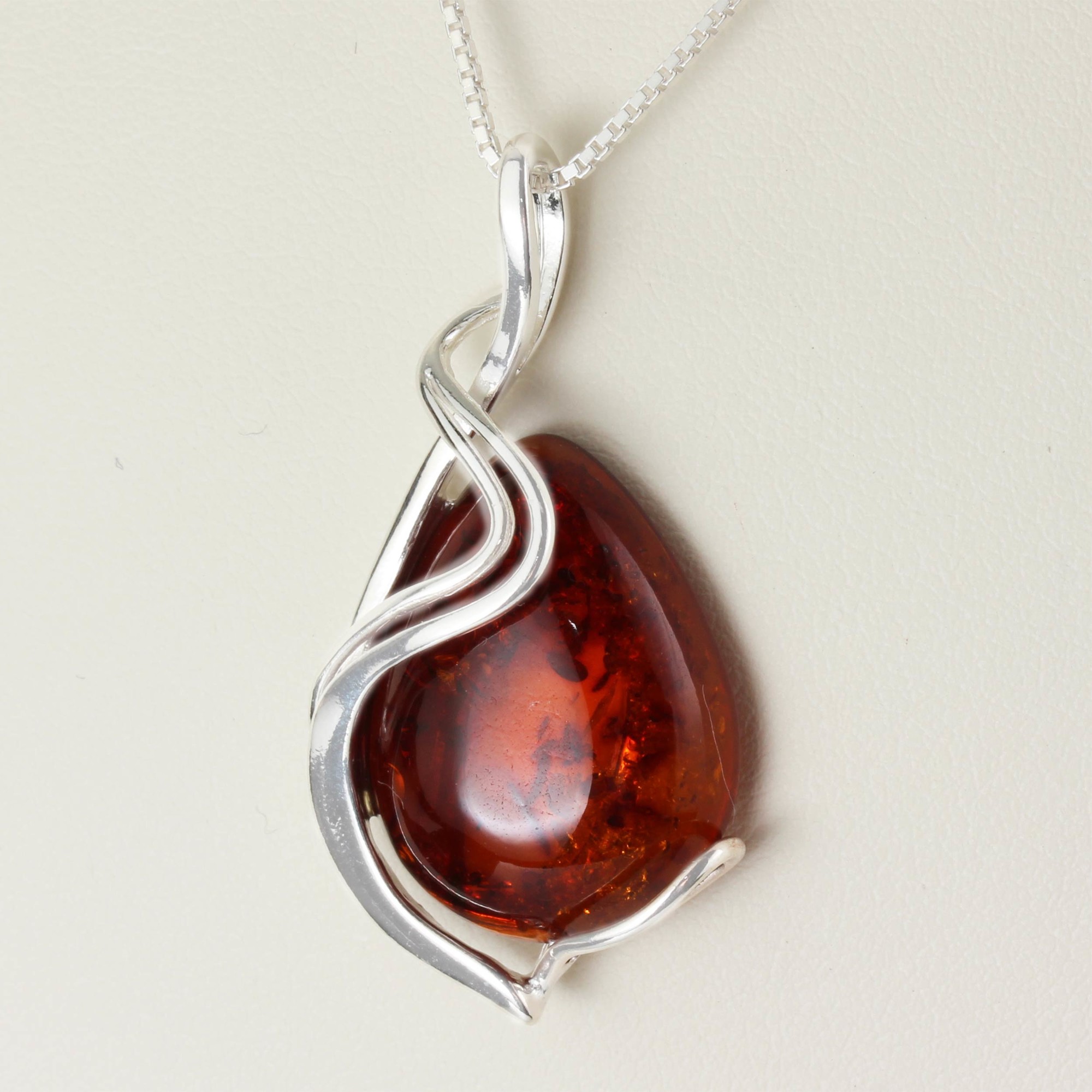 Baltic Amber Sterling Silver Pendant With Swirl Design Overlay